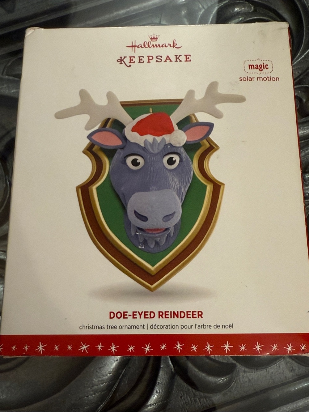 Hallmark Solar Motion Doe Eyed Reindeer Head Ornament with Red Santa Hat